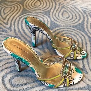 Sparkly green strappy patterned sole high heels
